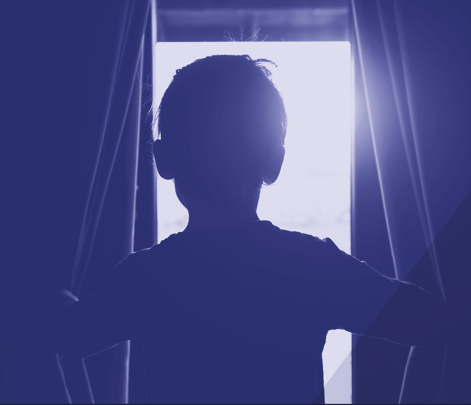 Young boy in blue silhouette opening curtains revealing the sunshine